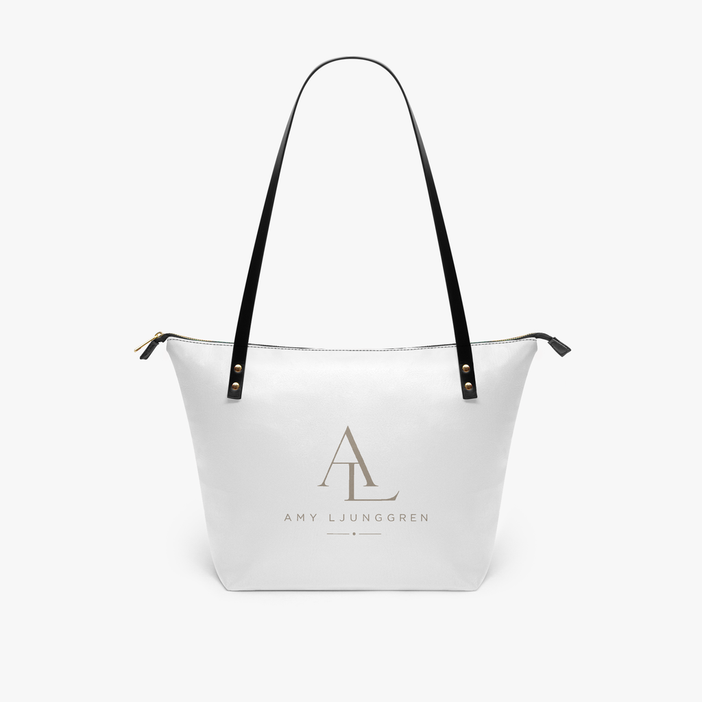 Rymlig totebag i konstläder