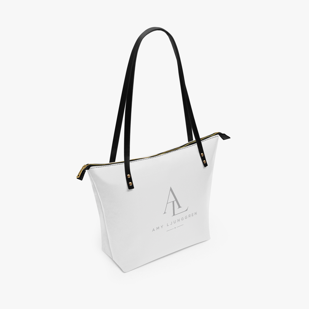 Rymlig totebag i konstläder